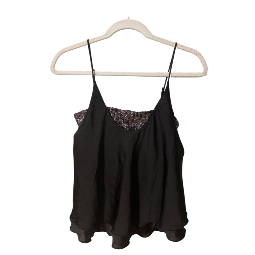 Boutique tank top! Great for fun events or NYE party! XS but fits like a S-M
